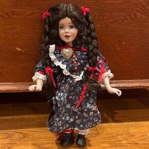Charming Doll with Red Accents